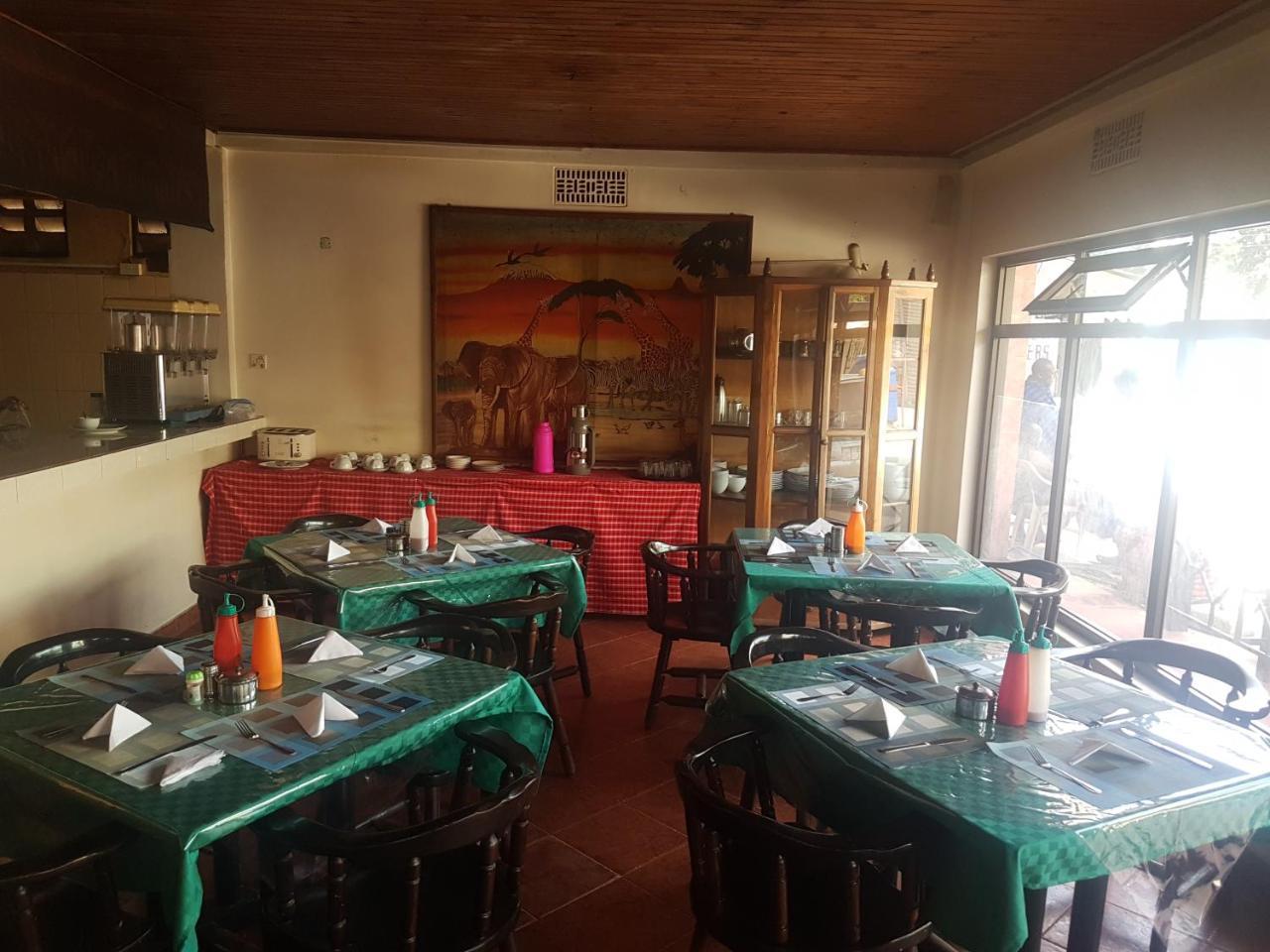 Center Inn Arusha Bagian luar foto